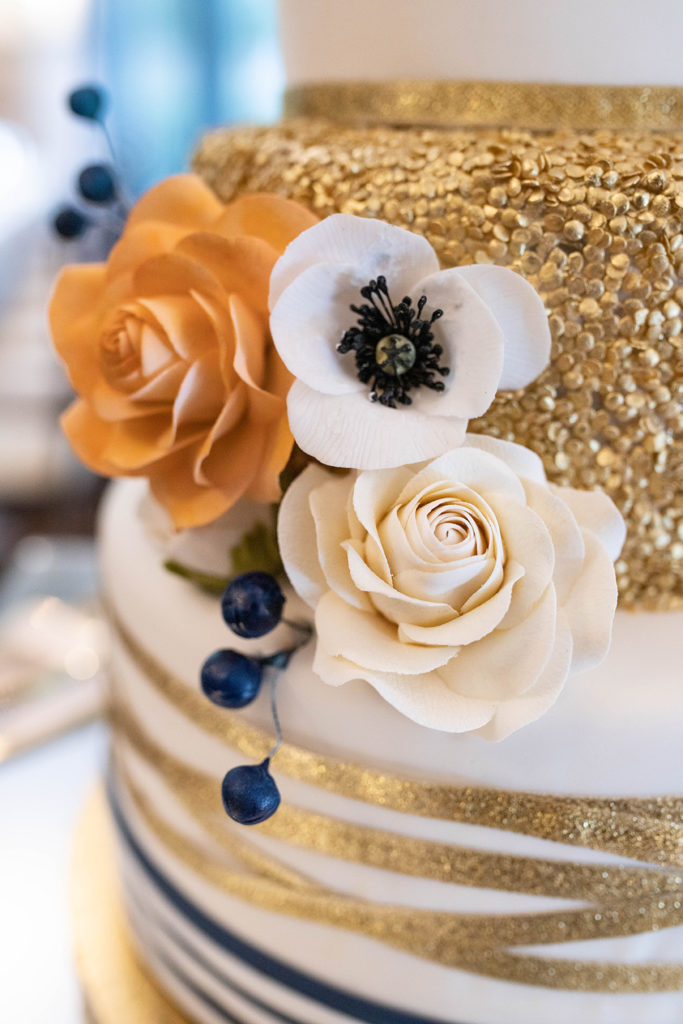 Gold Navy White Wedding Cake Florals