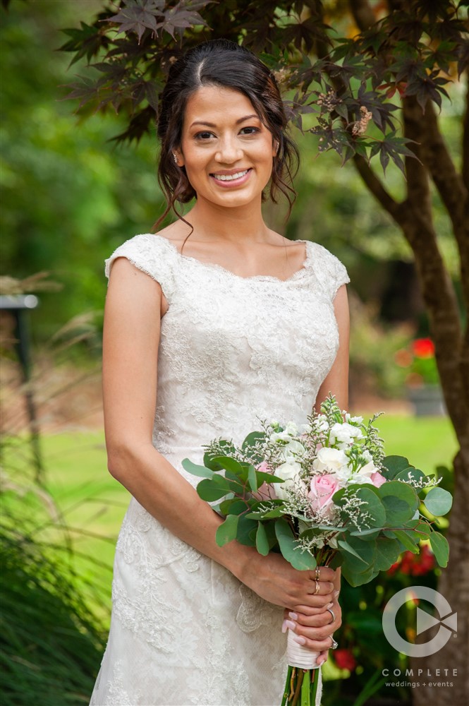Bride with Blush and white flowers