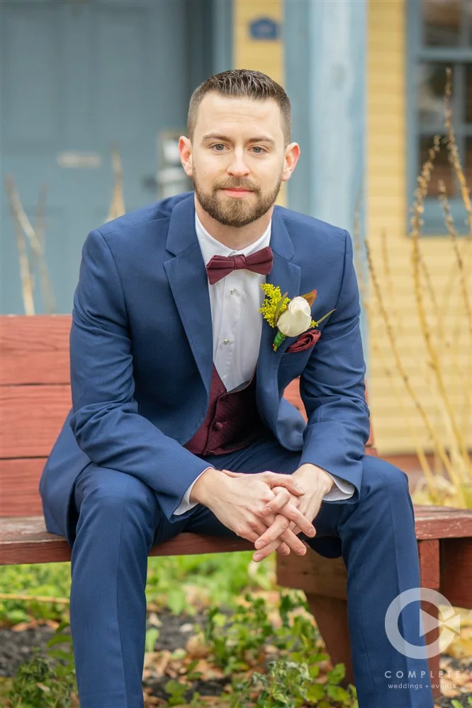 Groom with Burgundy bow tie