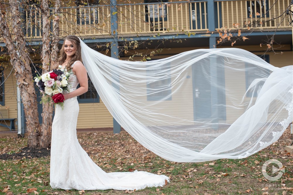 Bride and veil with big bouquet