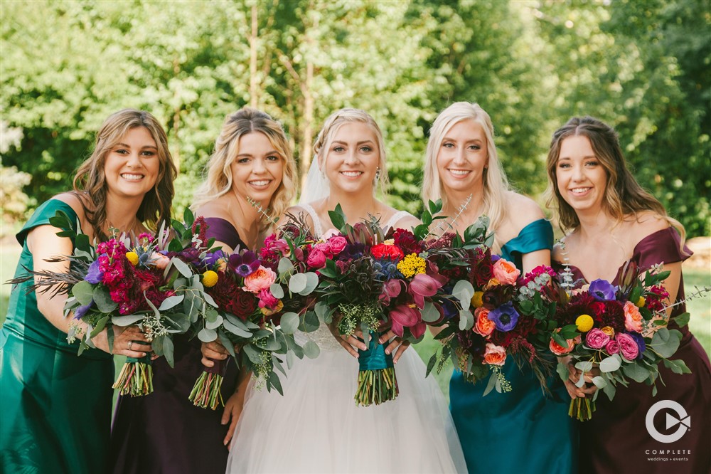 bridesmaids with big bouquets