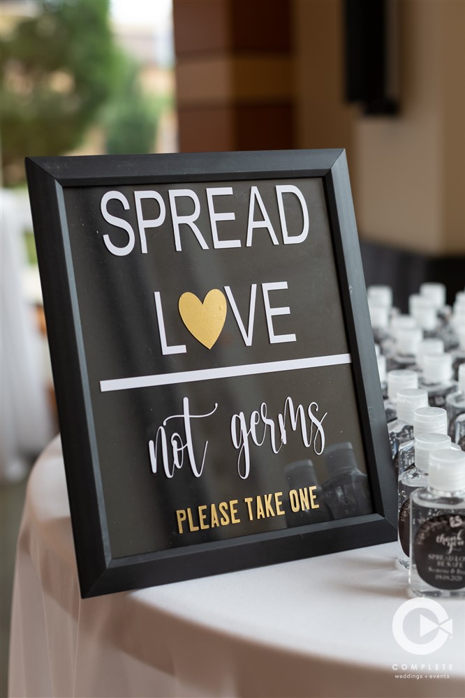 spread love not germs sign