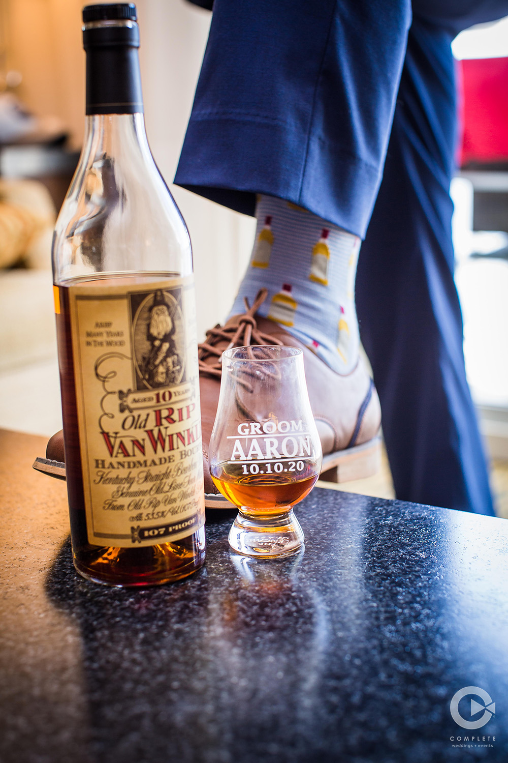 Groom socks and whiskey with custom glass